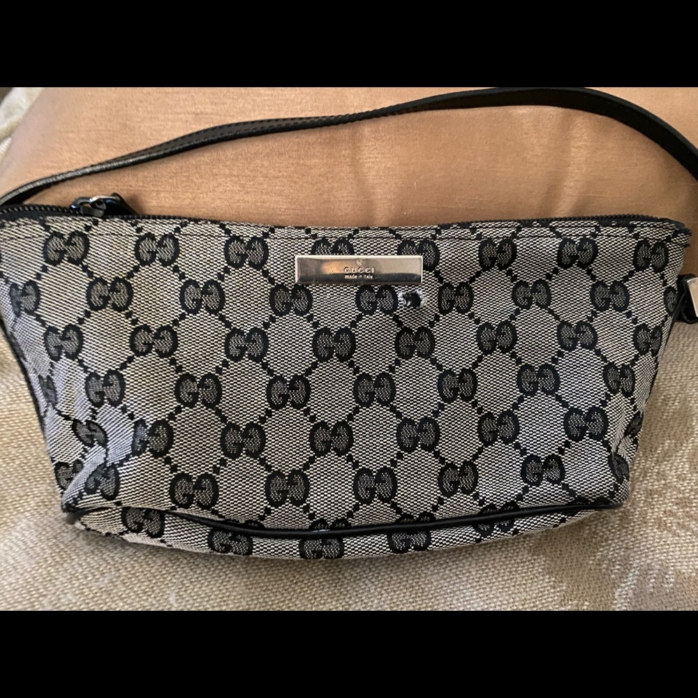 Authentic Gucci Blue gg pochette (mini bag) used